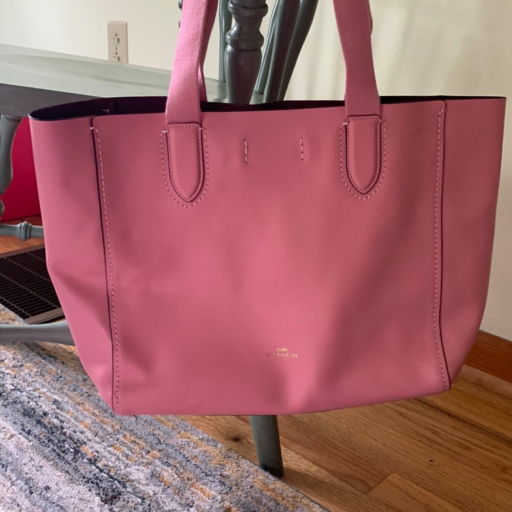 Pink Coach purse with brown interior. Very room inside.